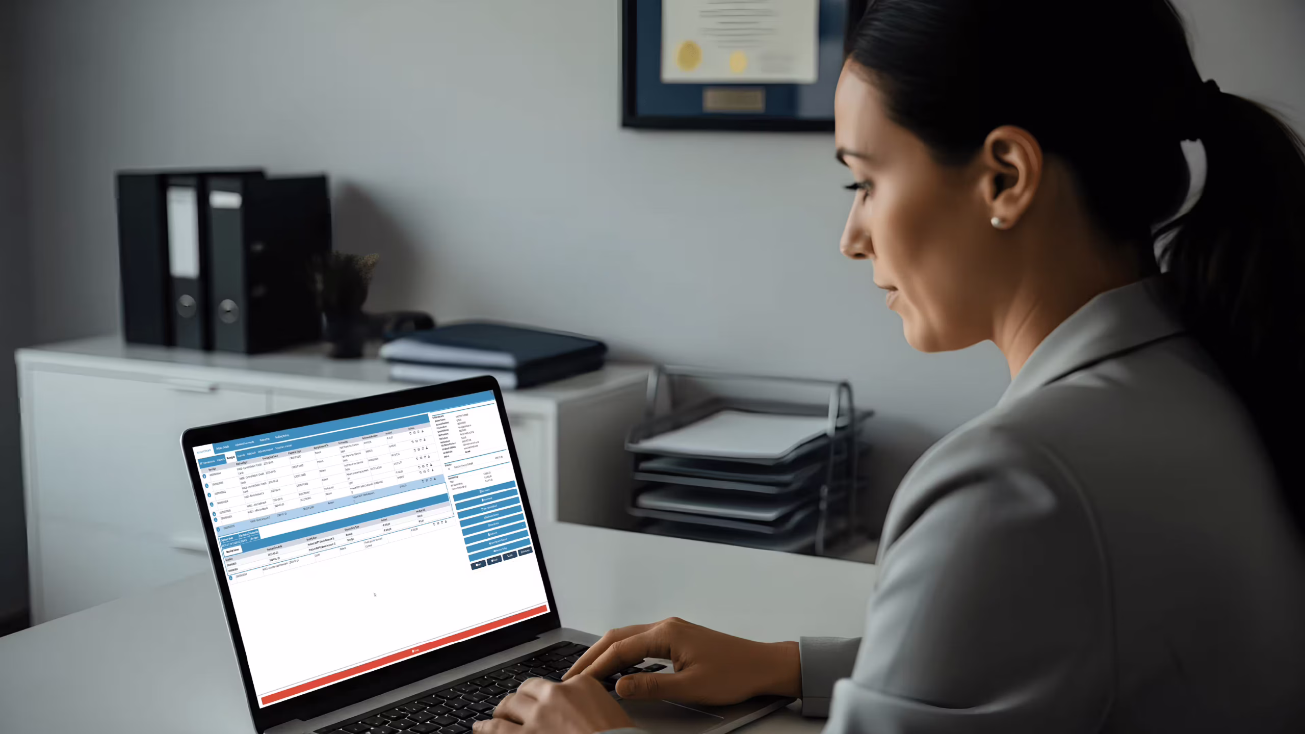 Medical billing software Ontario practice admin reviewing claims on laptop in Canadian clinic