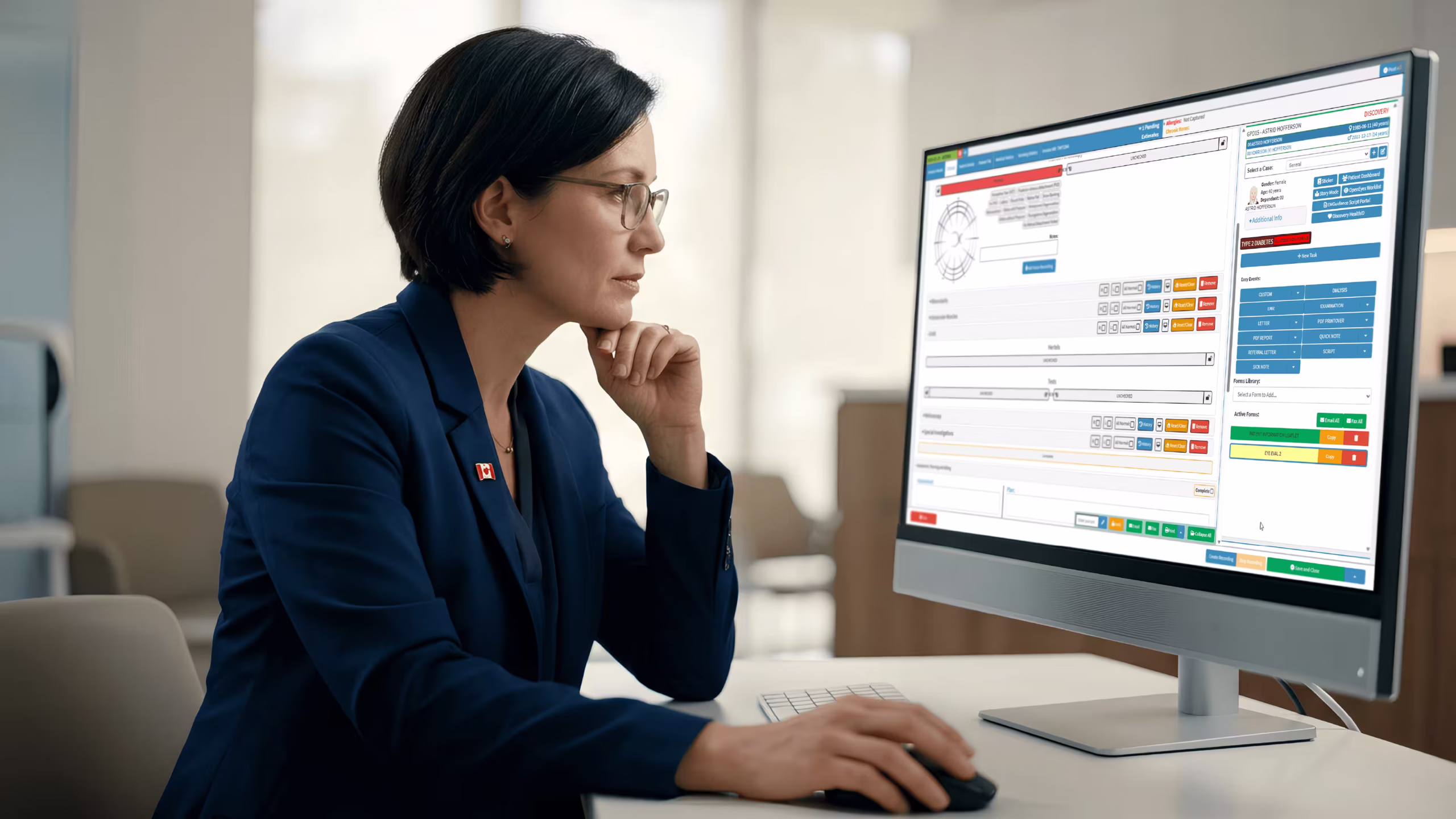 Canadian ophthalmologist reviewing patient records using ophthalmology practice management software