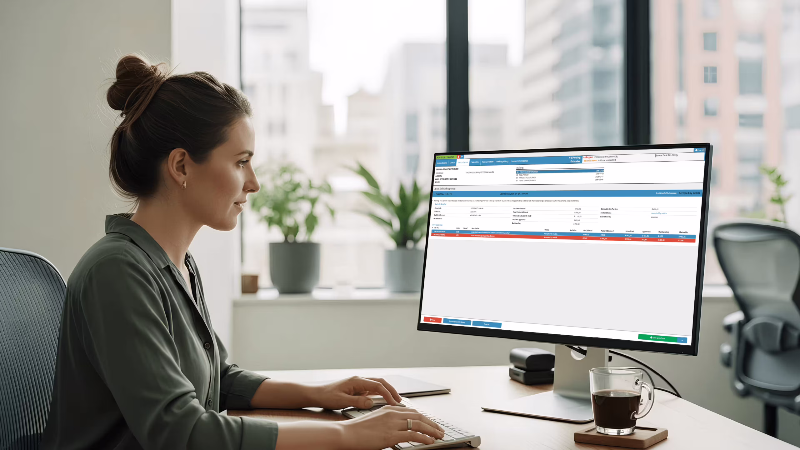 software-for-medical-billing-and-coding-goodx Billing specialist using software for medical billing and coding to submit and track claims